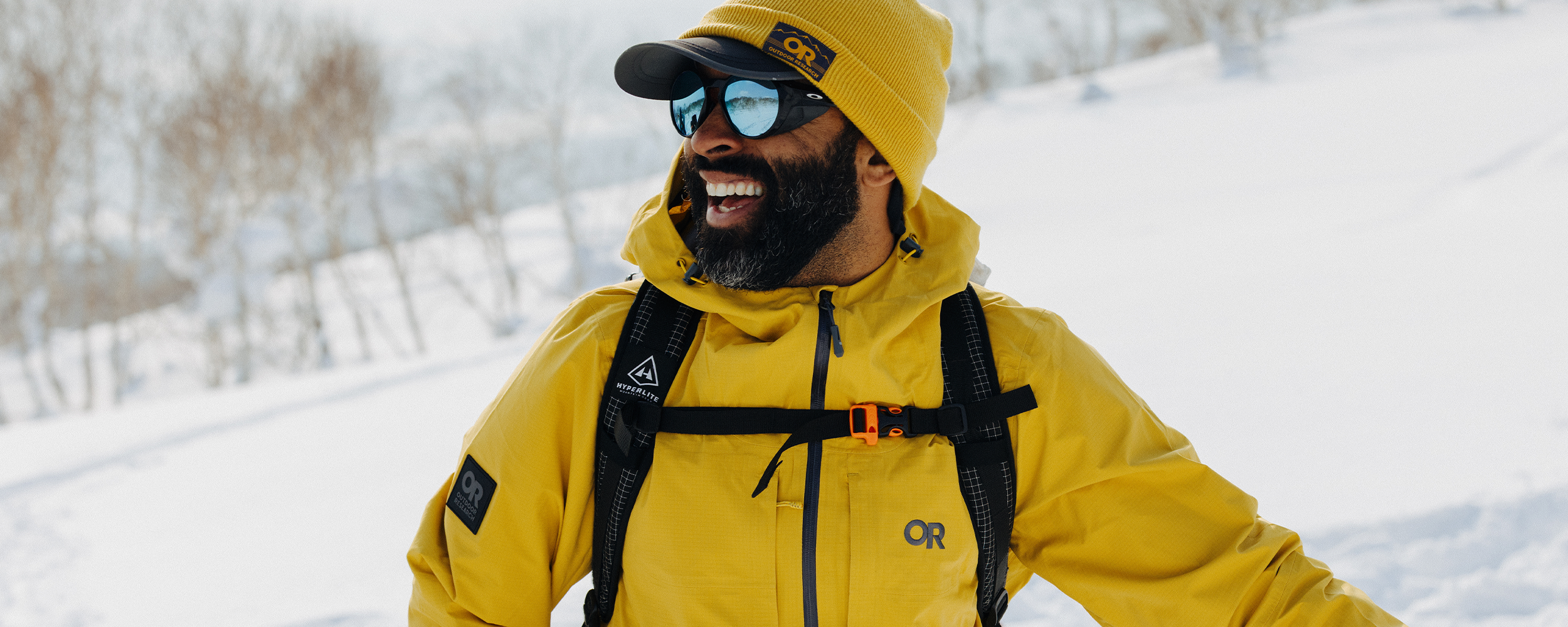 Male wearing Outdoor Research Carbide Jacket.