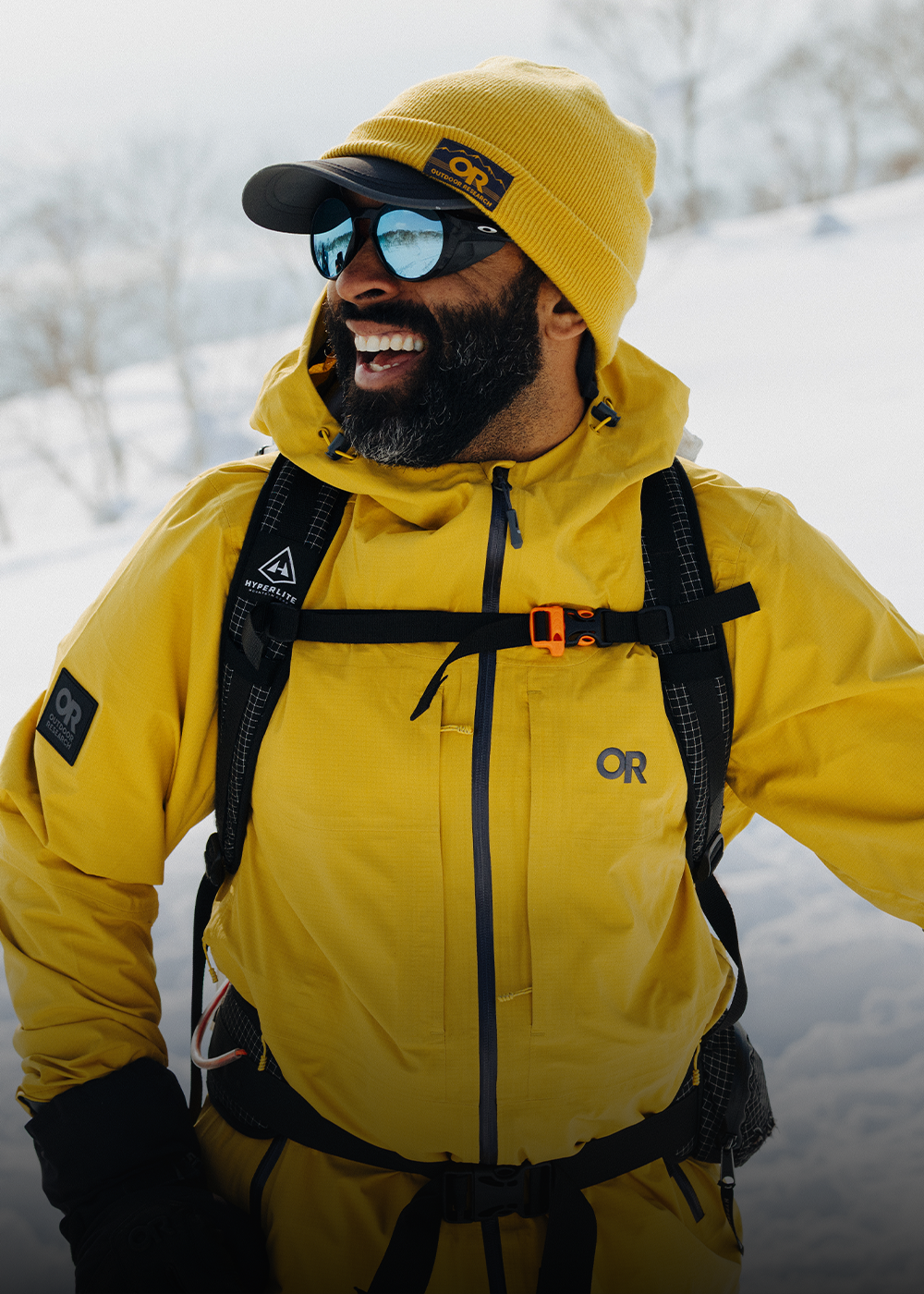 Male wearing Outdoor Research Carbide Jacket.